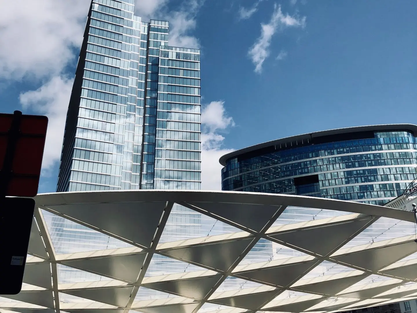 gray and white structure under blue sky